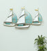 It consists of one sailboat design, it is constructed wrought iron that offers lasting usage, accented with multi coloured finish. Give your home space a unique coastal inspired theme by adding this beautiful looking sailboat decor accent.