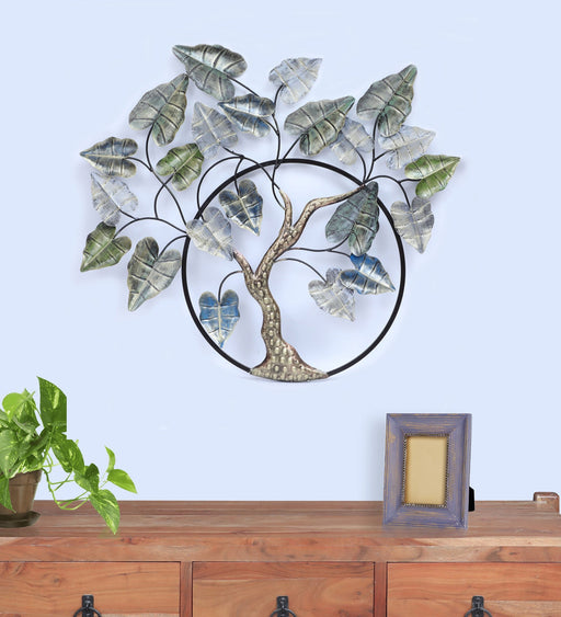 Find your Zen and reconnect with nature with the help of this crafty tree iron wall Decor. An infusion of multi colored hues and a symbolic tree, this wall Decor brings you closer to mother nature. Use it to liven up a bare wall or to spruce up an even livelier partition! It comes with a screw hole to ease in hanging this wall Decor. This wall Decor is very durable that it is suitable indoor use only. With its vintage look, it will sure be an amazing centerpiece to your space.