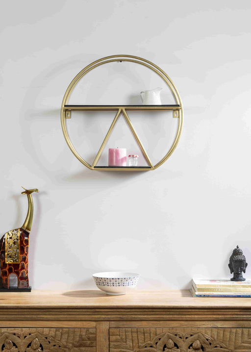 Turn any empty wall into a contemporary display with this wall shelf. Crafted of metal in a gold finish, Inside, two shelves are laid out asymmetrically – each a different size and shape – for you to display books, framed photos, small sculptures, and collected curios. Measuring 19" H x 20" W x 7" D overall, this shelf includes keyhole hangers for effortless installation.